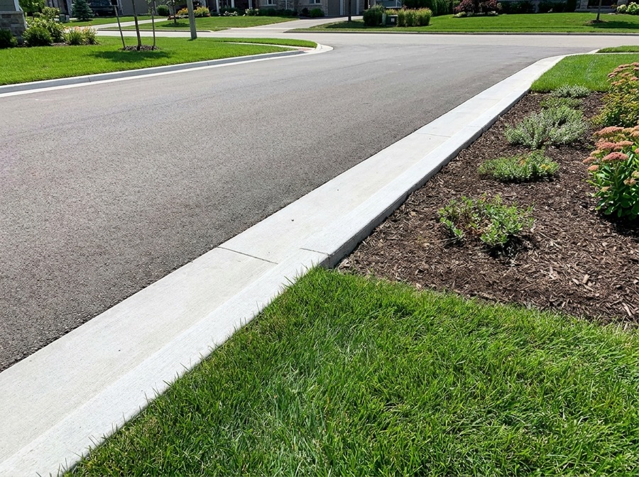 Concrete curb and edging along a Winnipeg driveway